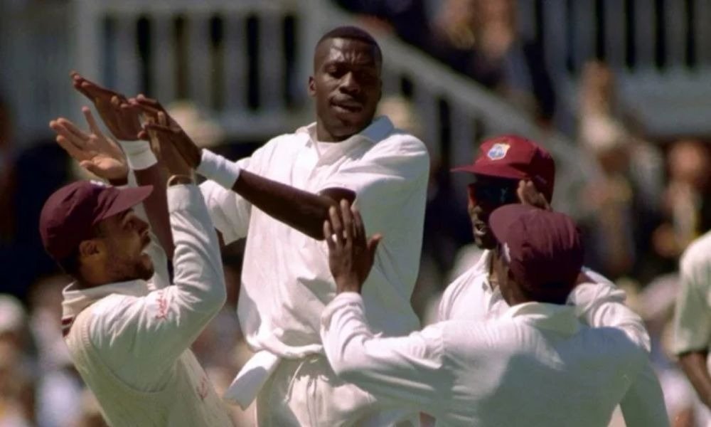 Curtly Ambrose celebrating a wicket with West Indies teammates during a Test match.