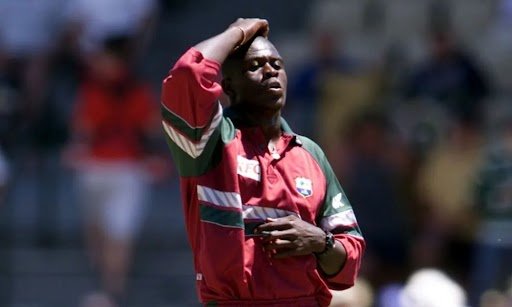 Cameron Cuffy, one of the tallest West Indies cricketers, is showing frustration during a match.