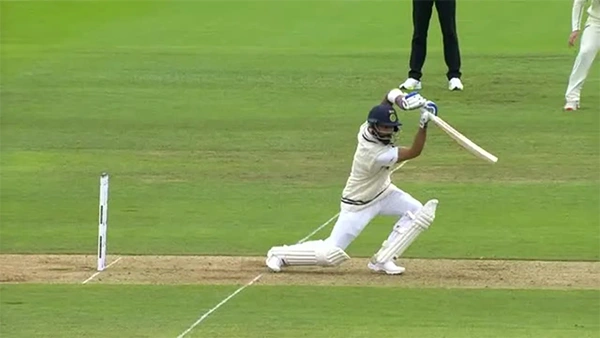 Batman playing cover drive